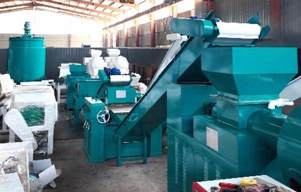 Soap making machine production line in factory workshop, full automatic soap manufacturing equipment