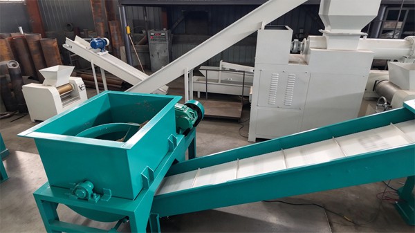 Full automatic bar soap production line with soap mixer and belt conveyor in factory workshop
