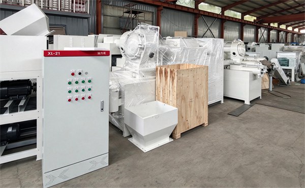 Electrical control cabinet for bar soap production plant, white soap making machine and feeding hopper in factory warehouse